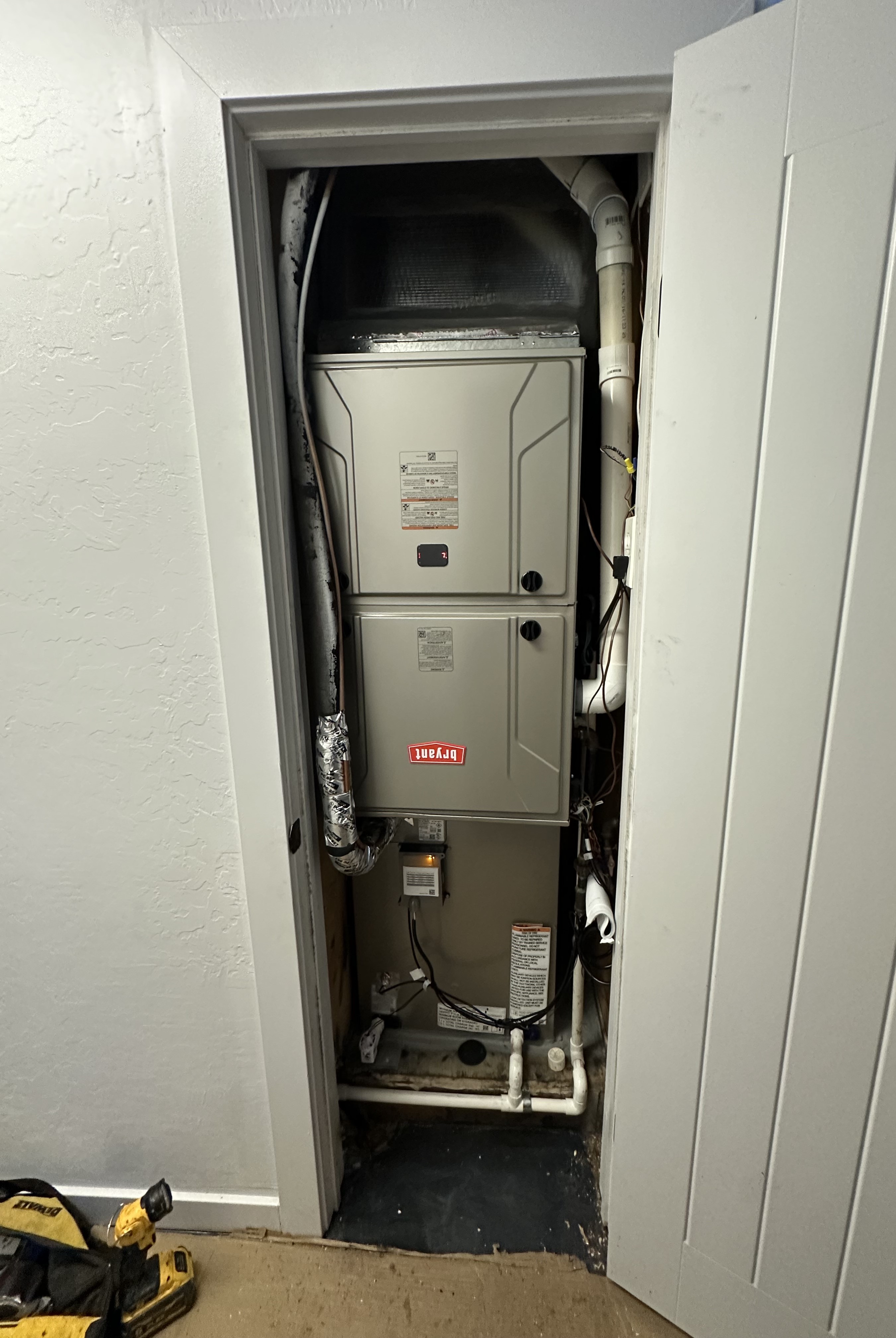 Wall-mounted split air conditioner in a modern interior, actively cooling the room with fresh airflow.